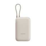 باور بنك شاومي بسعة ١٠٠٠٠ مللي أمبير قدرة شحن ٢٢٫٥ واط كابل مدمج لون تان جي إل